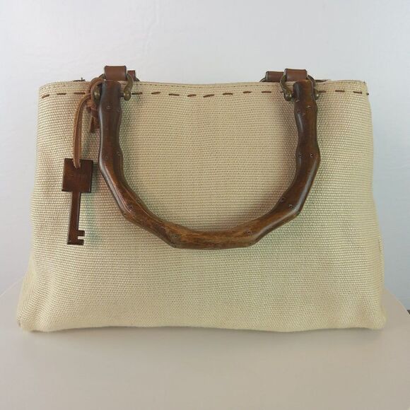 Fossil Handbags - Fossil cream fabric handbag with leather trim, and faux wood handles